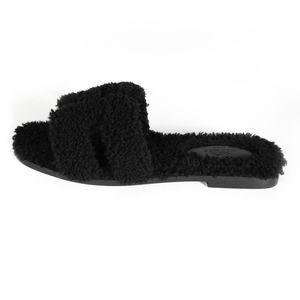 Hermès - Black Hermès Shearling Oran sandal (37 EUR)
